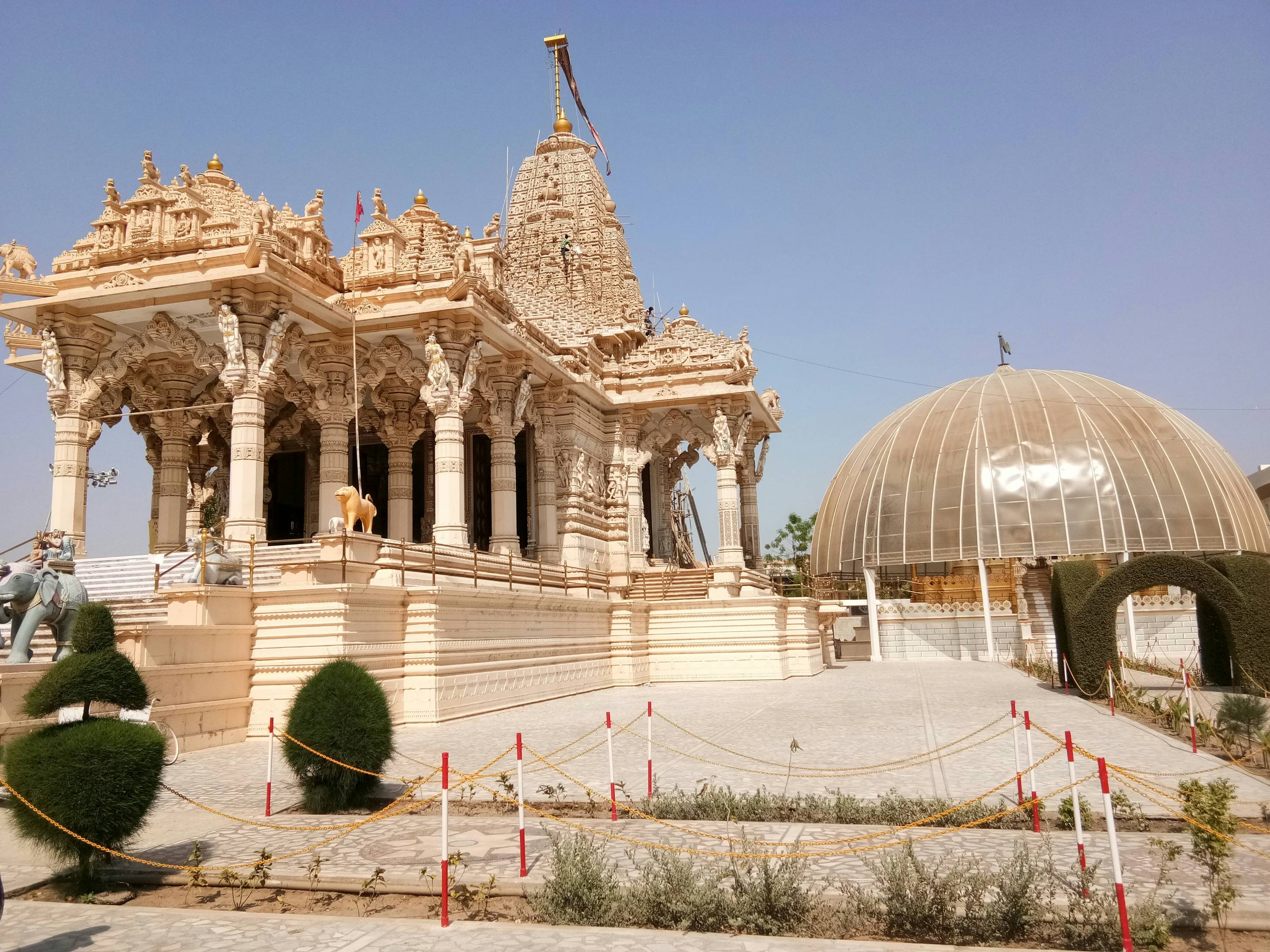 a large white building with a dome on top of it