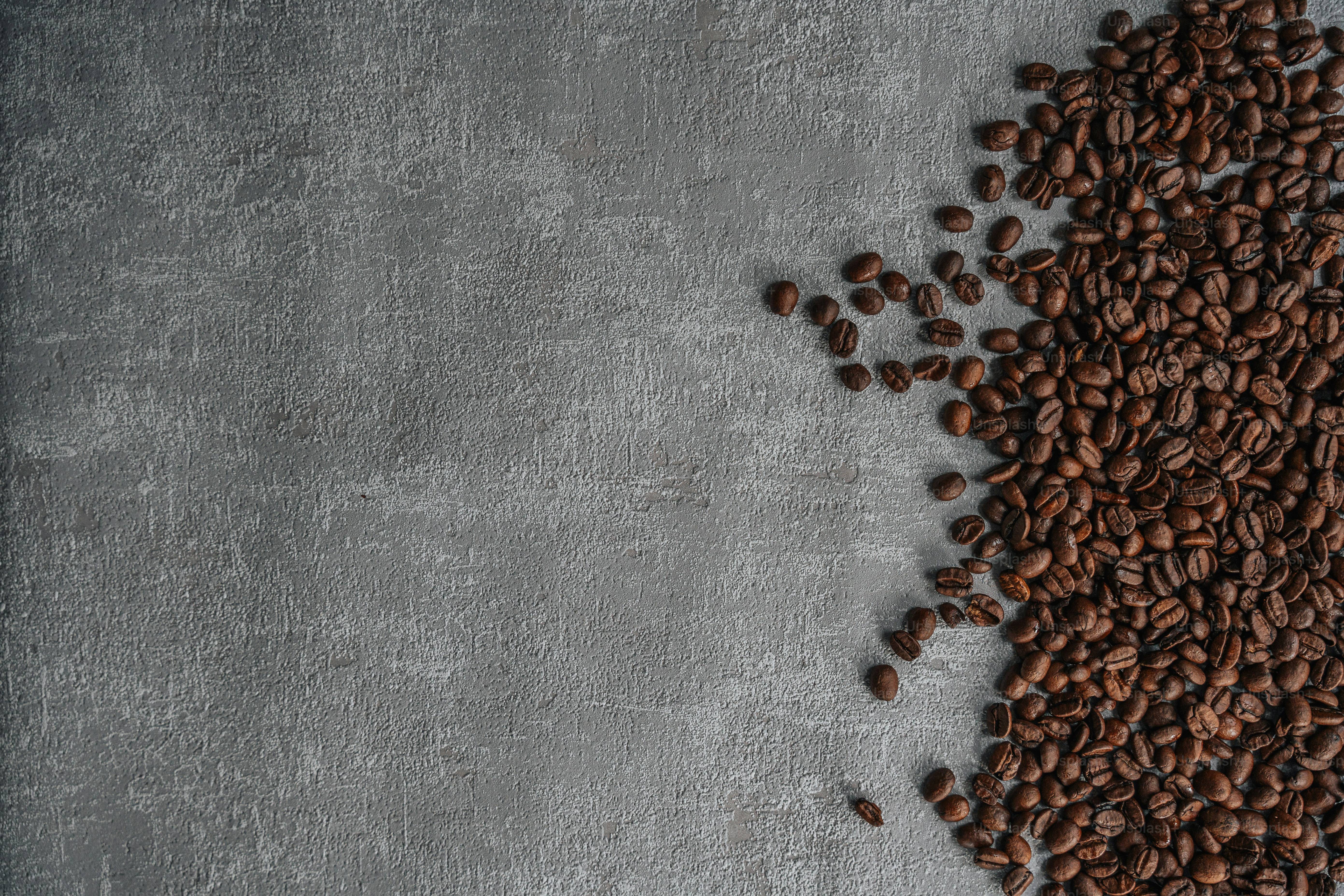 a pile of coffee beans sitting on top of a table